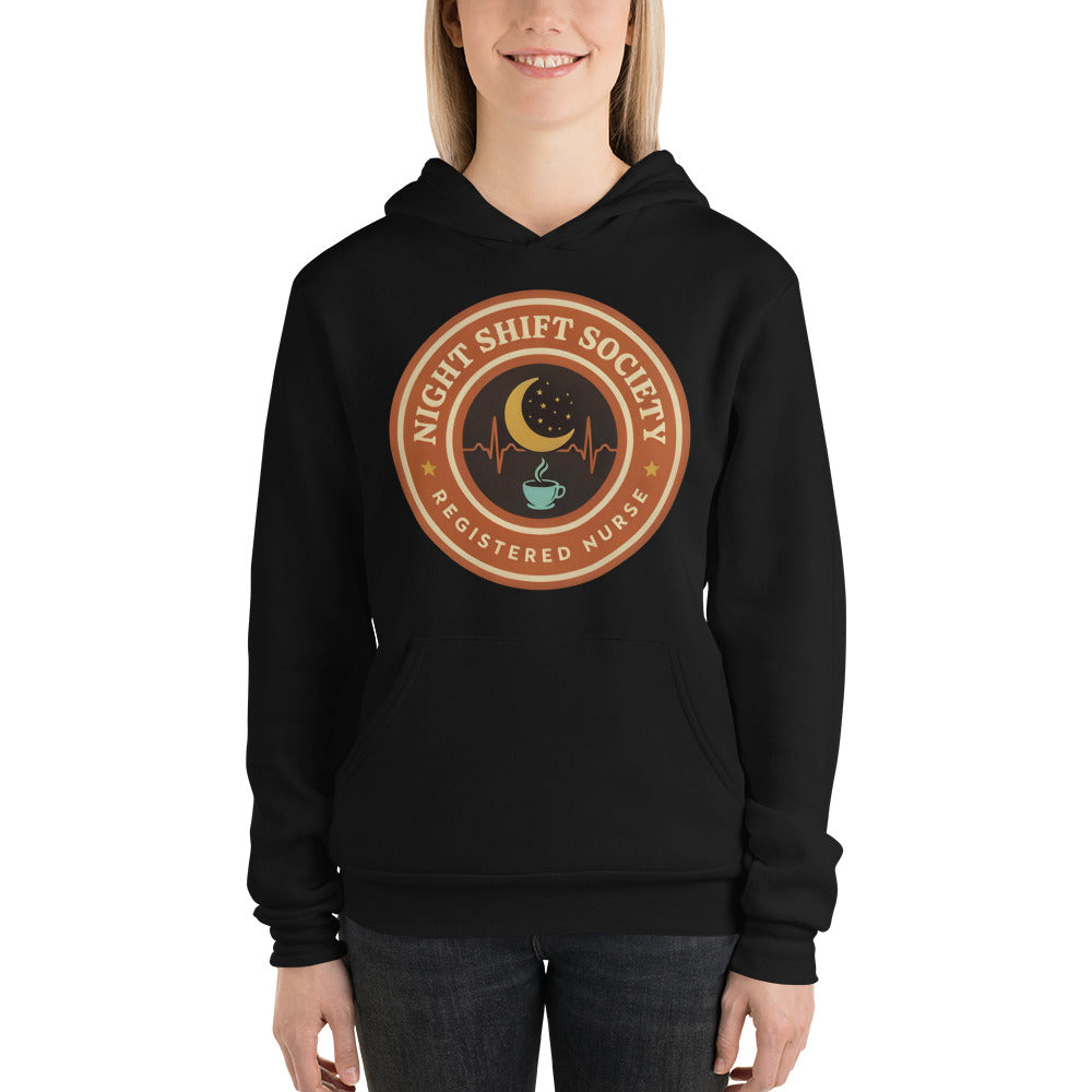 Night Shift Society retro registered nurse badge hoodie — Black, on model