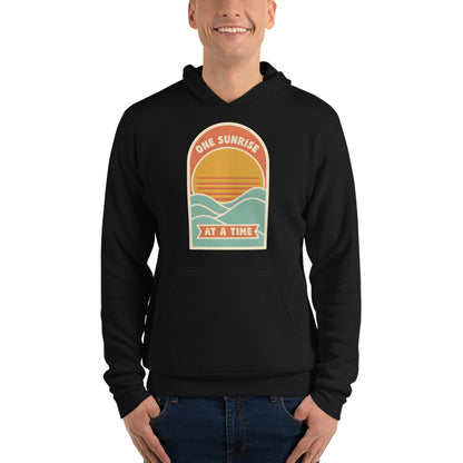 One Sunrise at a Time retro sunrise hoodie — Black, on model