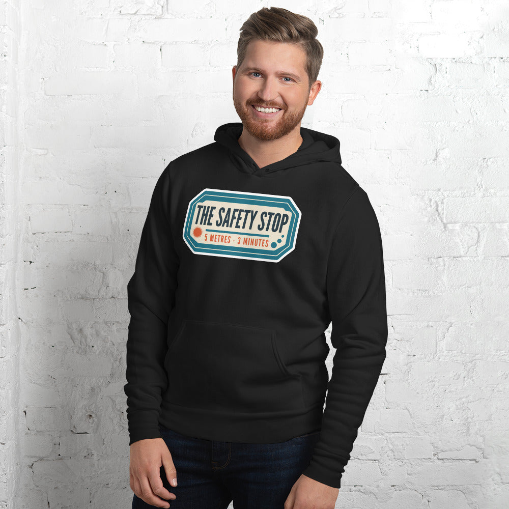 The Safety Stop vintage scuba diving travel decal hoodie — Black, on model