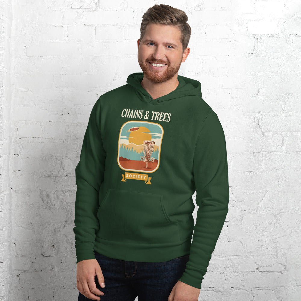Chains & Trees Society disc golf retro landscape hoodie — Forest, on model