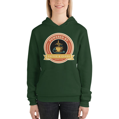 Powered by Coffee & Chaos retro nurse badge hoodie — Forest, on model