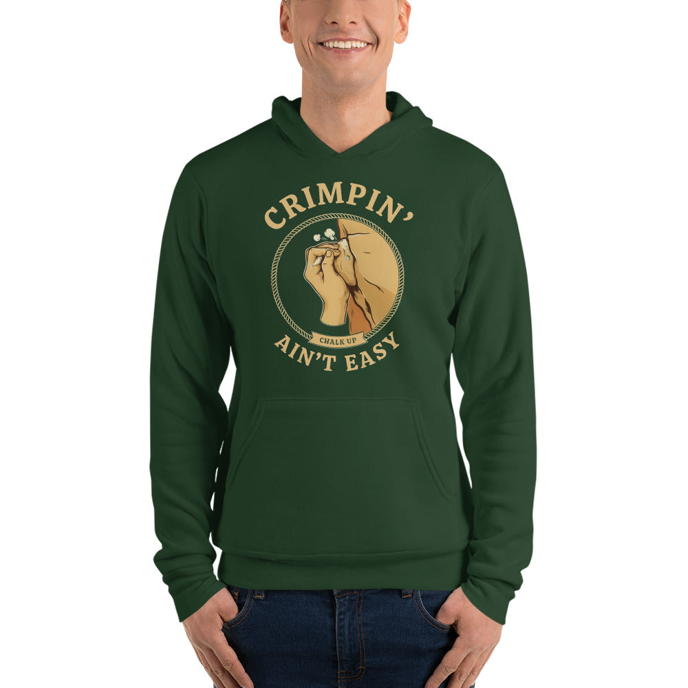 Crimpin' Ain't Easy bouldering badge hoodie — Forest, on model