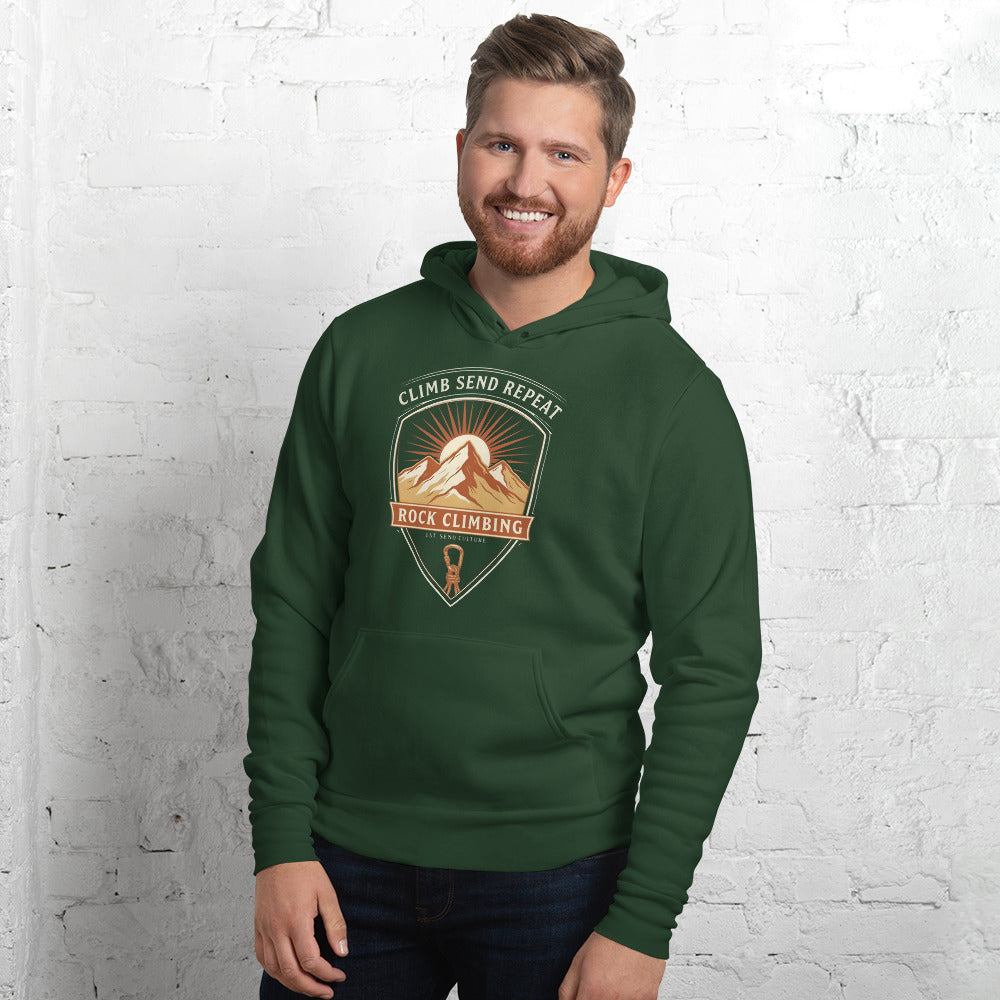 Climb Send Repeat mountaineering crest hoodie — Forest, on model