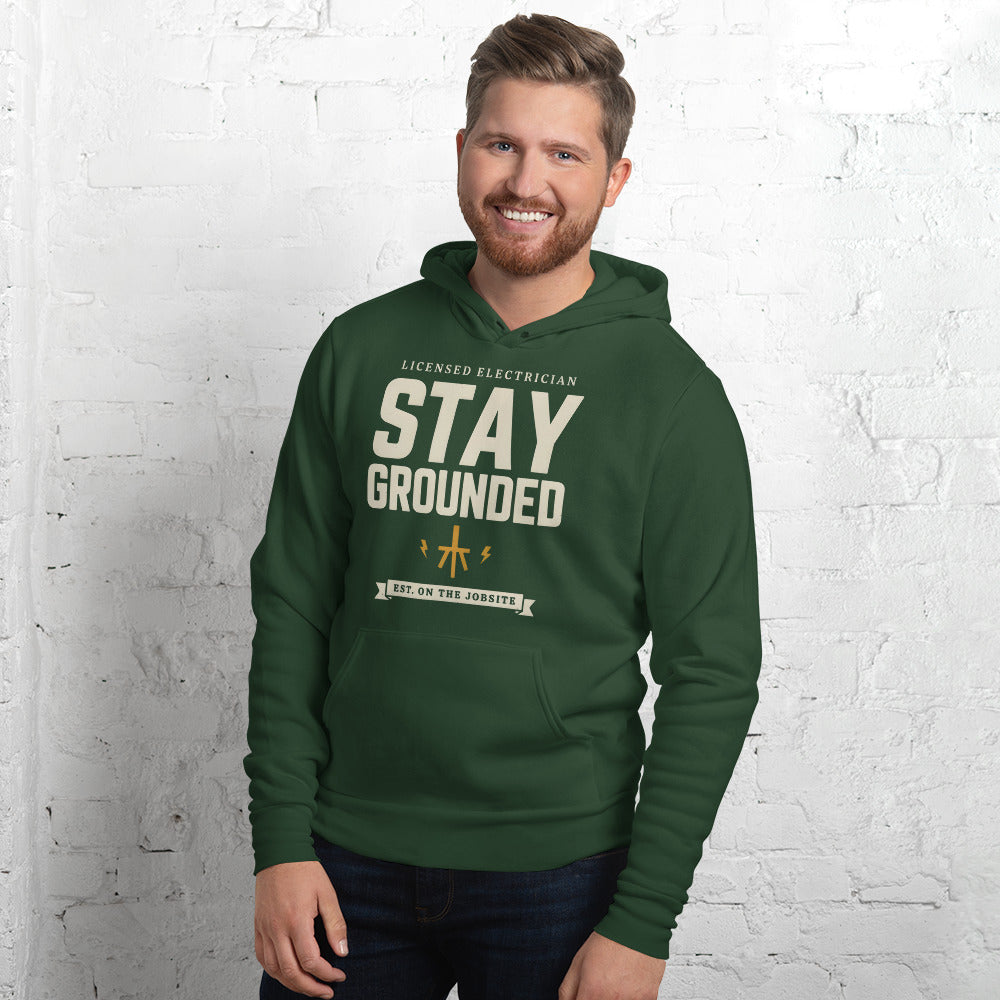 Stay Grounded funny electrician hoodie — Forest, on model
