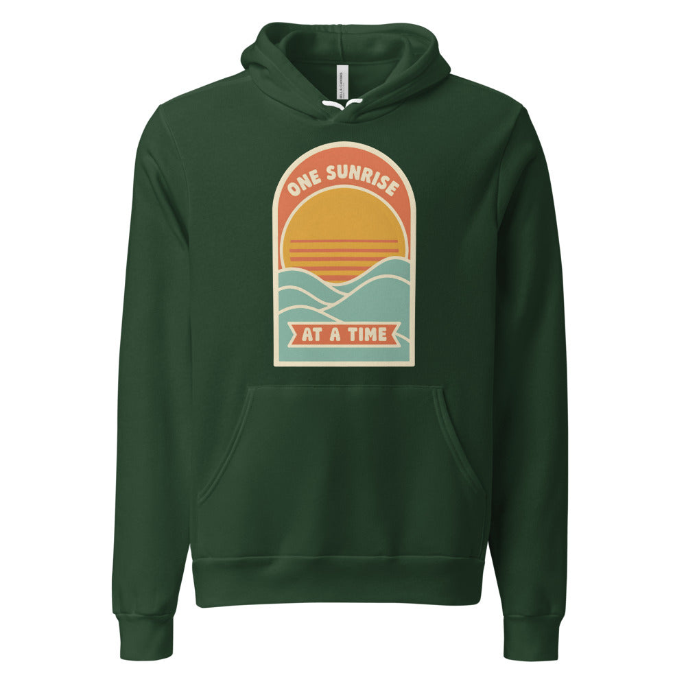 One Sunrise at a Time retro sunrise hoodie — Forest, front