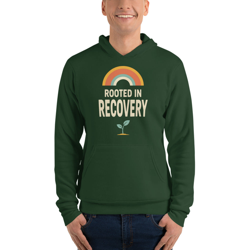 Rooted in Recovery retro rainbow hoodie — Forest, on model
