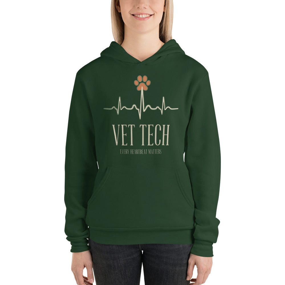 Every Heartbeat Matters minimalist vet tech hoodie — Forest, on model
