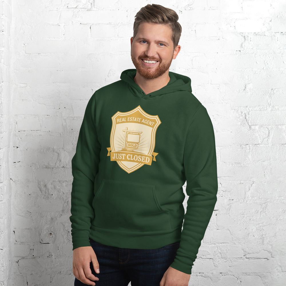 Just Closed real estate agent hoodie — Forest, on model