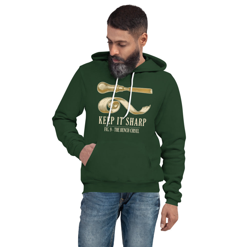 Keep It Sharp woodworking hoodie — Forest, on model