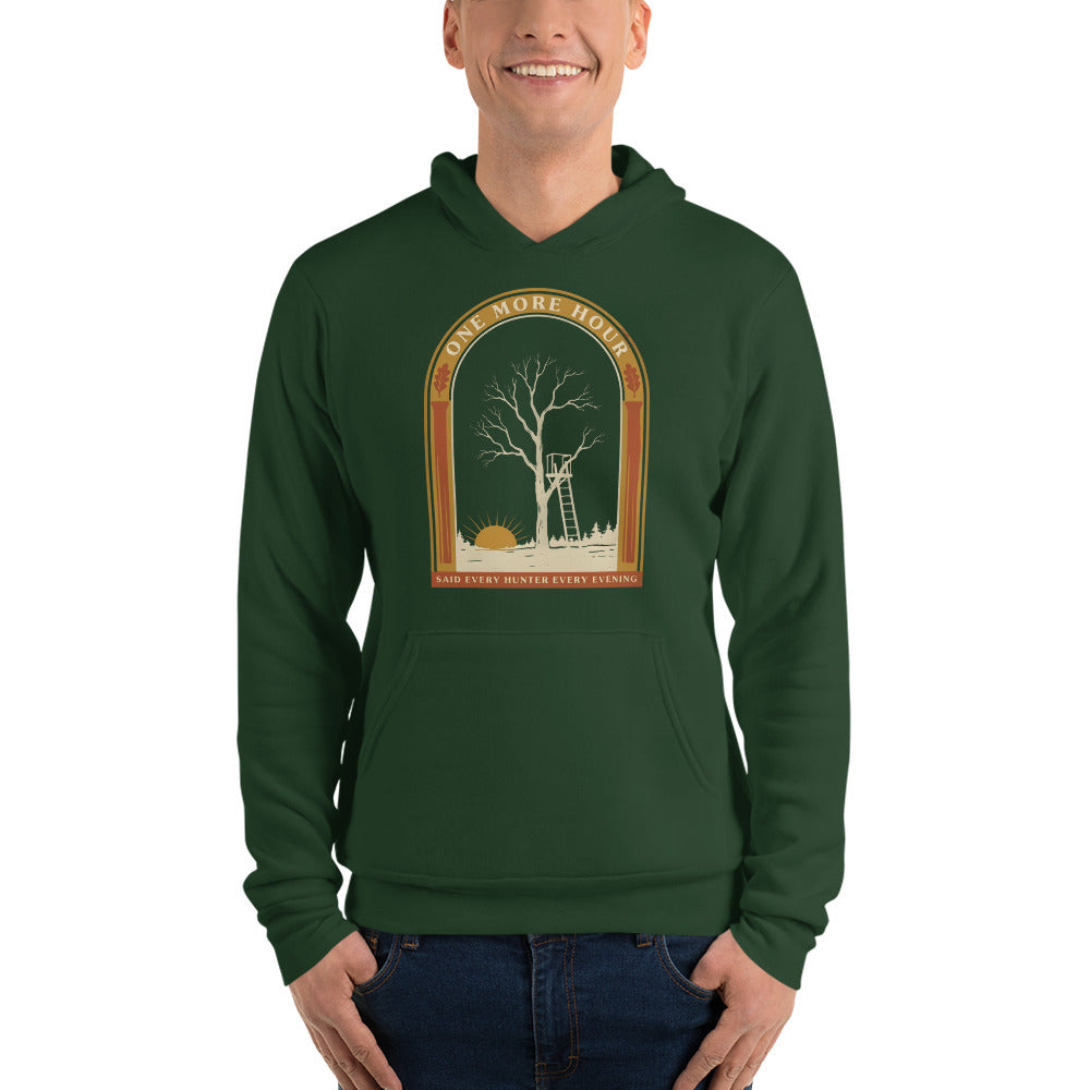 One More Hour funny deer hunting hoodie — Forest, on model