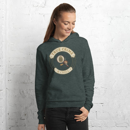 True Crime and Chill vintage case-file badge hoodie — Heather Forest, on model