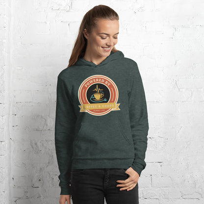 Powered by Coffee & Chaos retro nurse badge hoodie — Heather Forest, on model