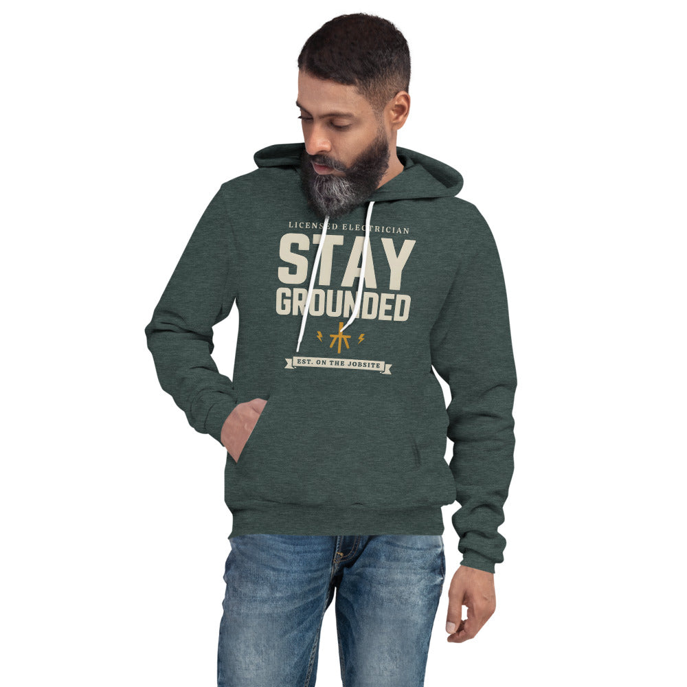 Stay Grounded funny electrician hoodie — Heather Forest, on model