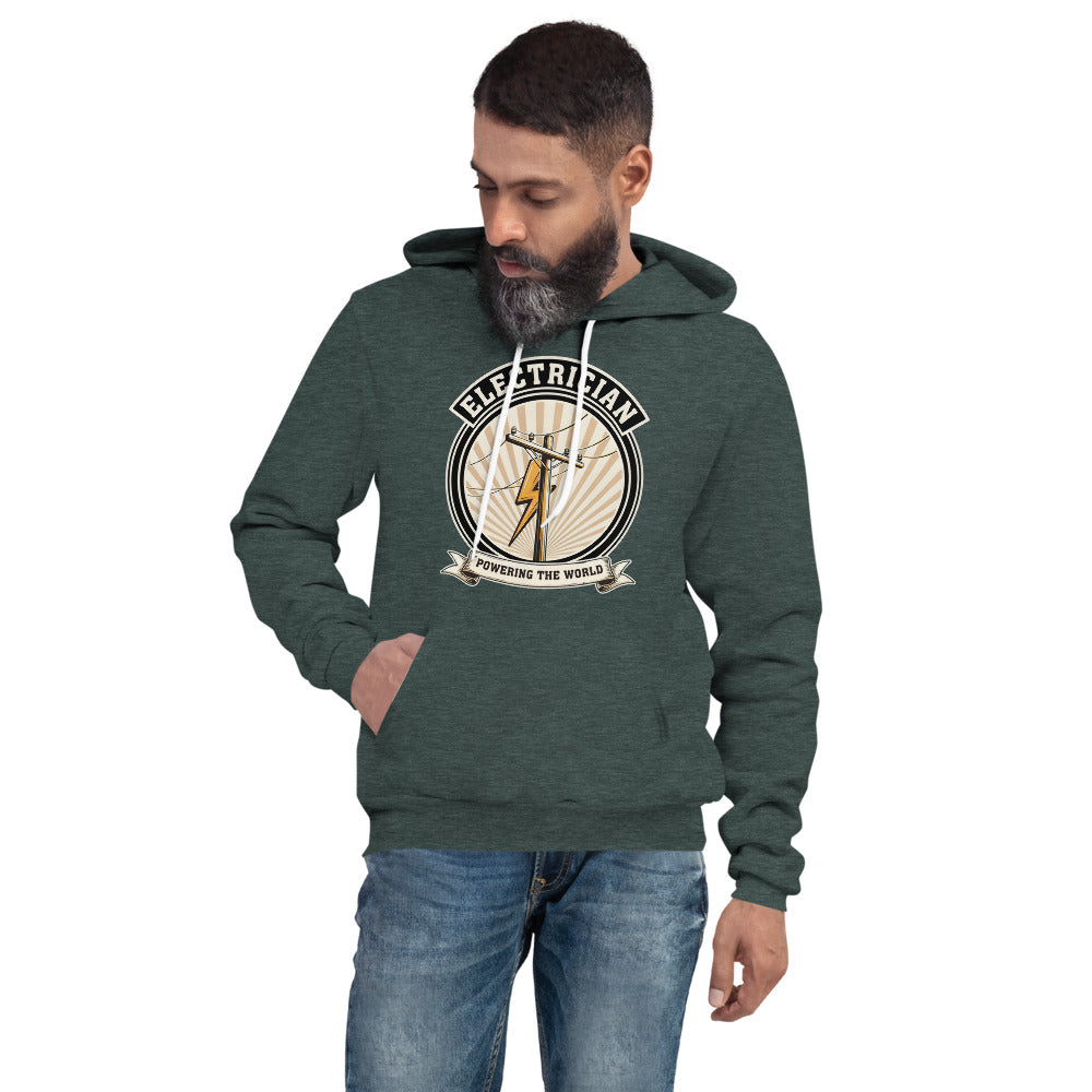 Powering The World electrician emblem hoodie — Heather Forest, on model