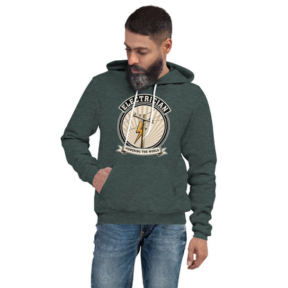 Powering The World electrician emblem hoodie — Heather Forest, on model
