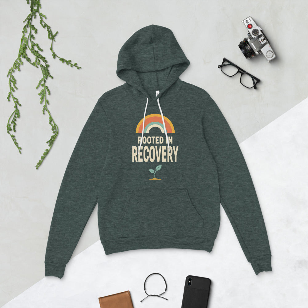 Rooted in Recovery retro rainbow hoodie — Heather Forest, flat lay