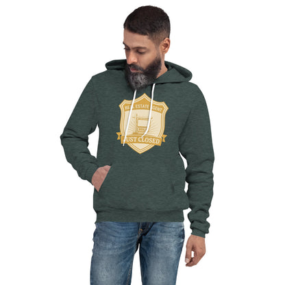 Just Closed real estate agent hoodie — Heather Forest, on model