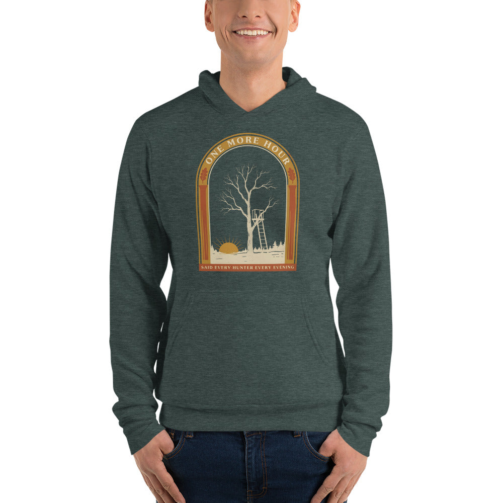 One More Hour funny deer hunting hoodie — Heather Forest, on model