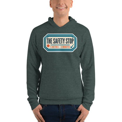 The Safety Stop vintage scuba diving travel decal hoodie — Heather Forest, on model