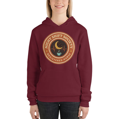Night Shift Society retro registered nurse badge hoodie — Maroon, on model