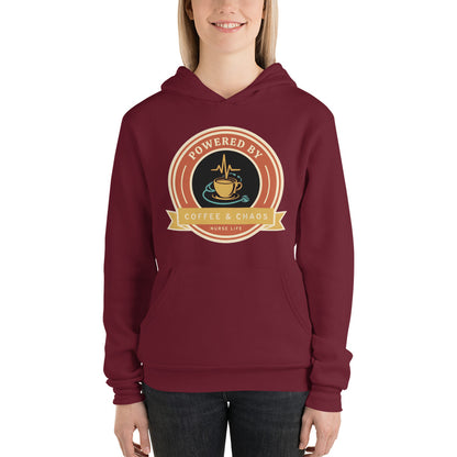 Powered by Coffee & Chaos retro nurse badge hoodie — Maroon, on model
