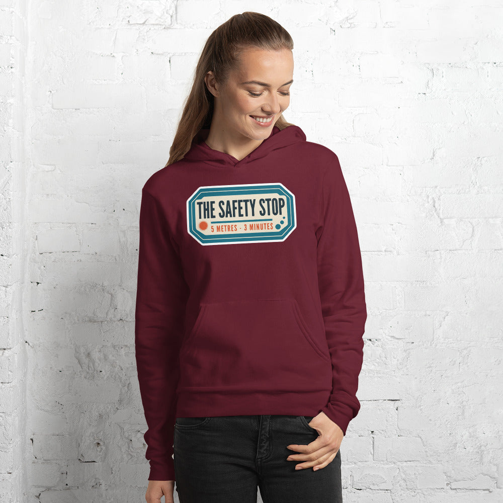 The Safety Stop vintage scuba diving travel decal hoodie — Maroon, on model