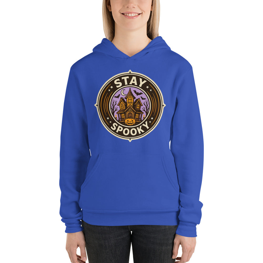 Stay Spooky retro Halloween vintage badge hoodie — True Royal, on model
