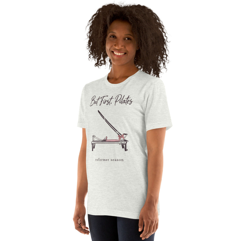 But First Pilates reformer line-art tee — Ash, on model