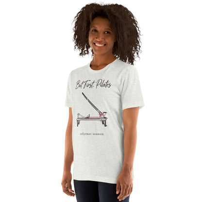 But First Pilates reformer line-art tee — Ash, on model
