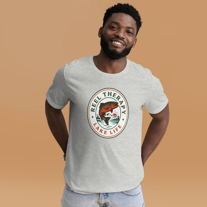 Reel Therapy retro national-park trout badge fishing tee — Athletic Heather, on model