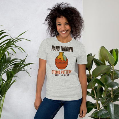 Hand Thrown Studio Pottery retro poster t-shirt — Athletic Heather, on model