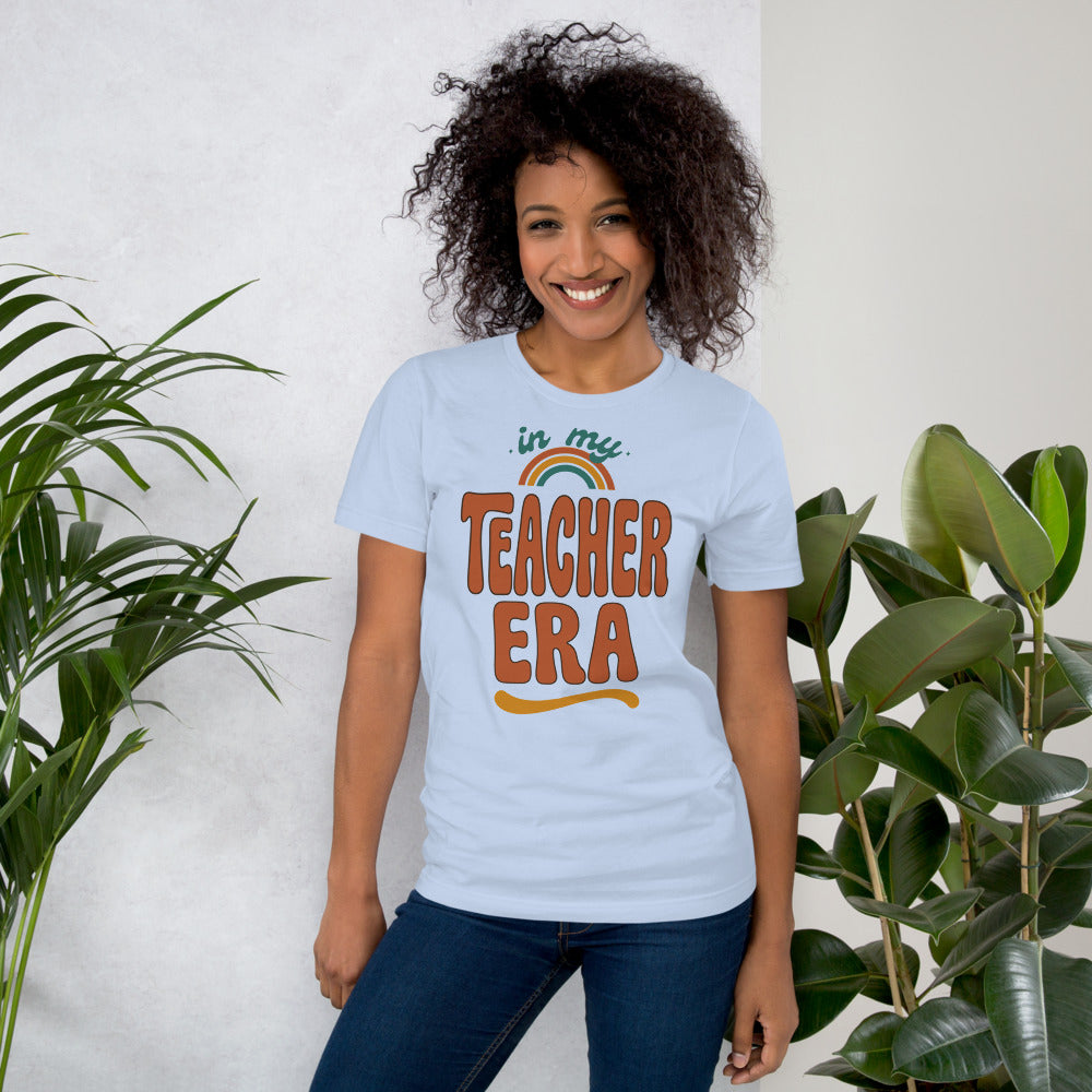 In My Teacher Era retro groovy teacher tee — Baby Blue, on model