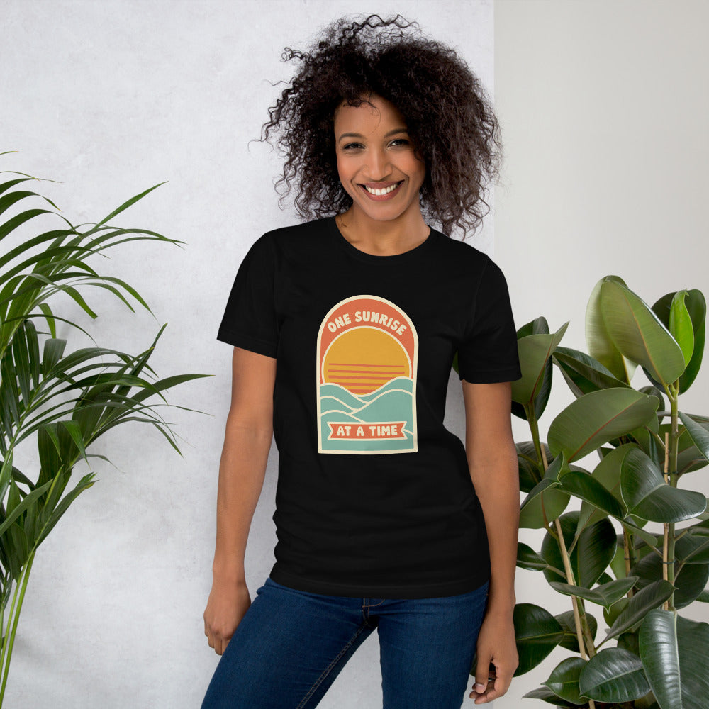 One Sunrise at a Time retro sunrise tee — Black, on model