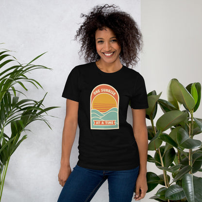 One Sunrise at a Time retro sunrise tee — Black, on model