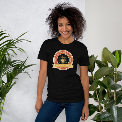 Powered by Coffee & Chaos retro nurse badge tee — Black, on model