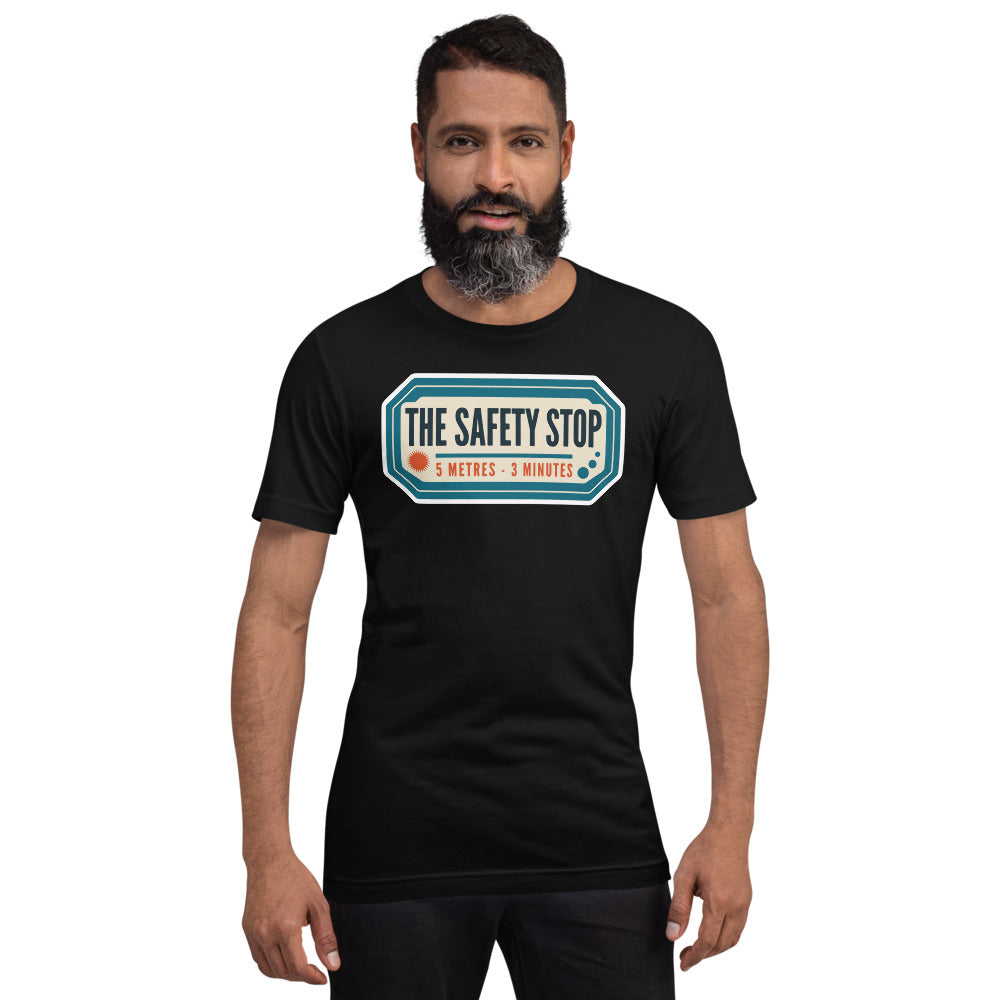 The Safety Stop vintage scuba diving travel decal t-shirt — Black, on model
