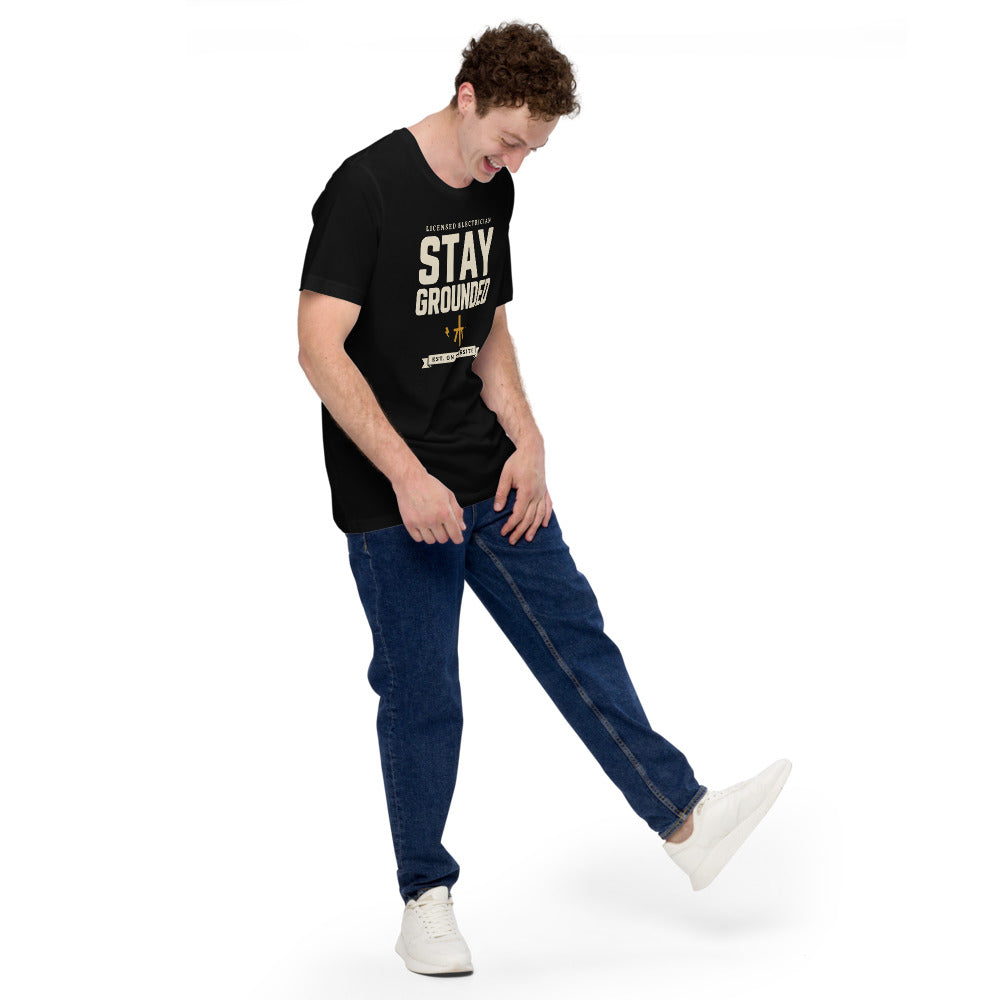 Stay Grounded funny electrician tee — Black, on model