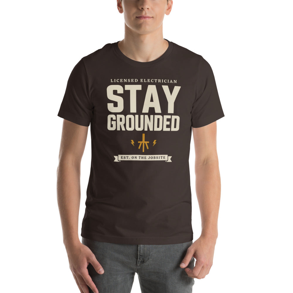 Stay Grounded funny electrician tee — Brown, on model