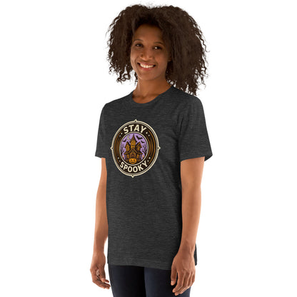Stay Spooky retro Halloween vintage badge tee — Dark Grey Heather, on model