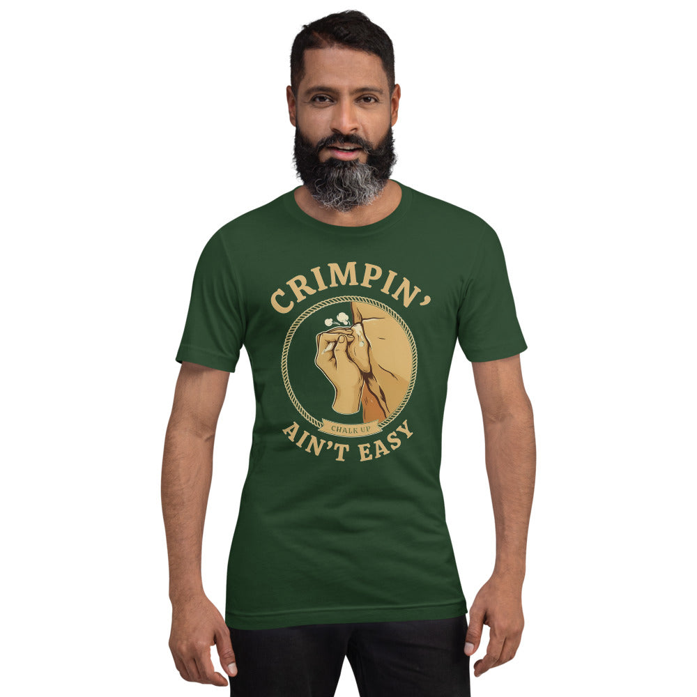 Crimpin' Ain't Easy bouldering badge t-shirt — Forest, on model