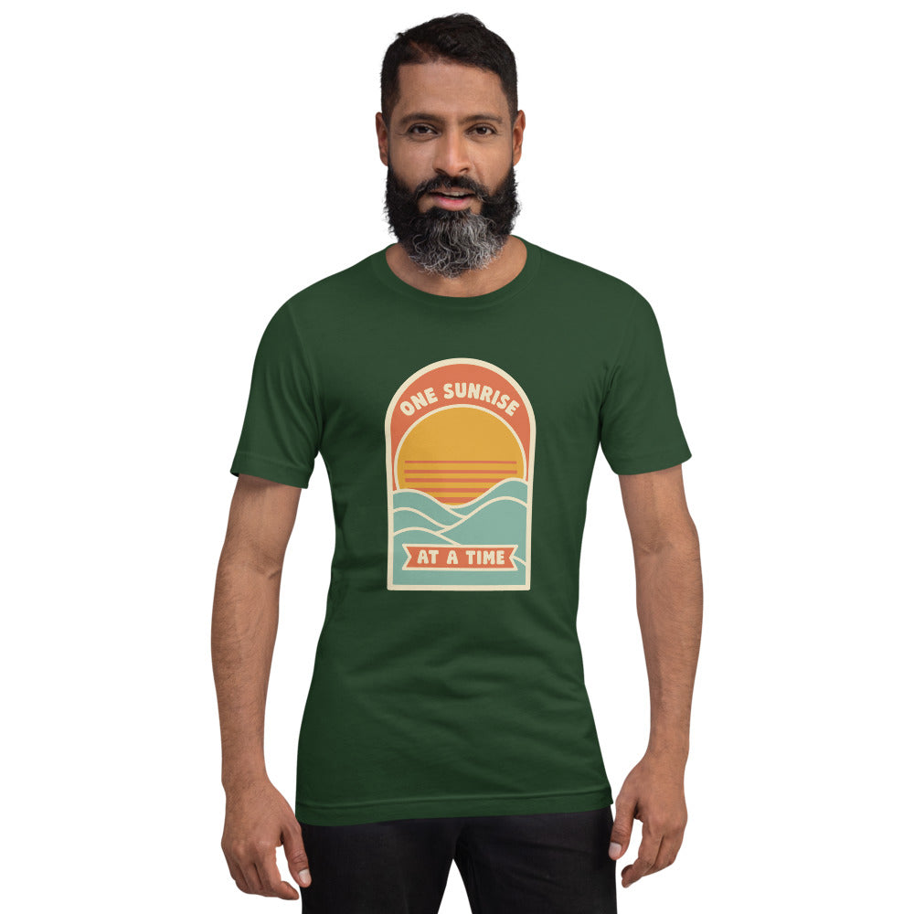 One Sunrise at a Time retro sunrise tee — Forest, on model