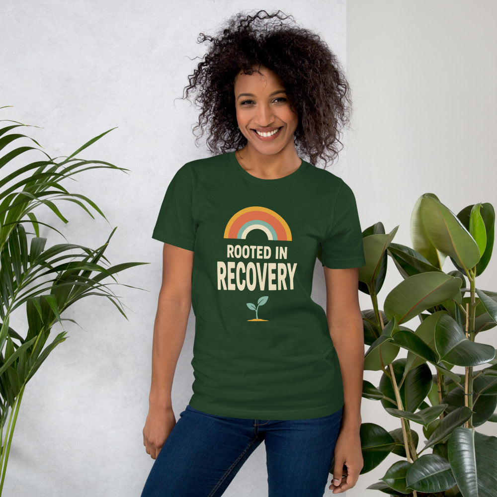 Rooted in Recovery retro rainbow tee — Forest, on model
