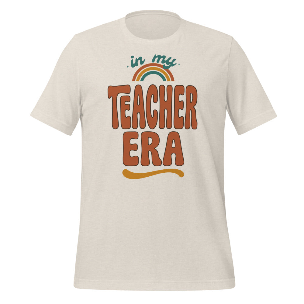 In My Teacher Era retro groovy teacher tee — Heather Dust, front