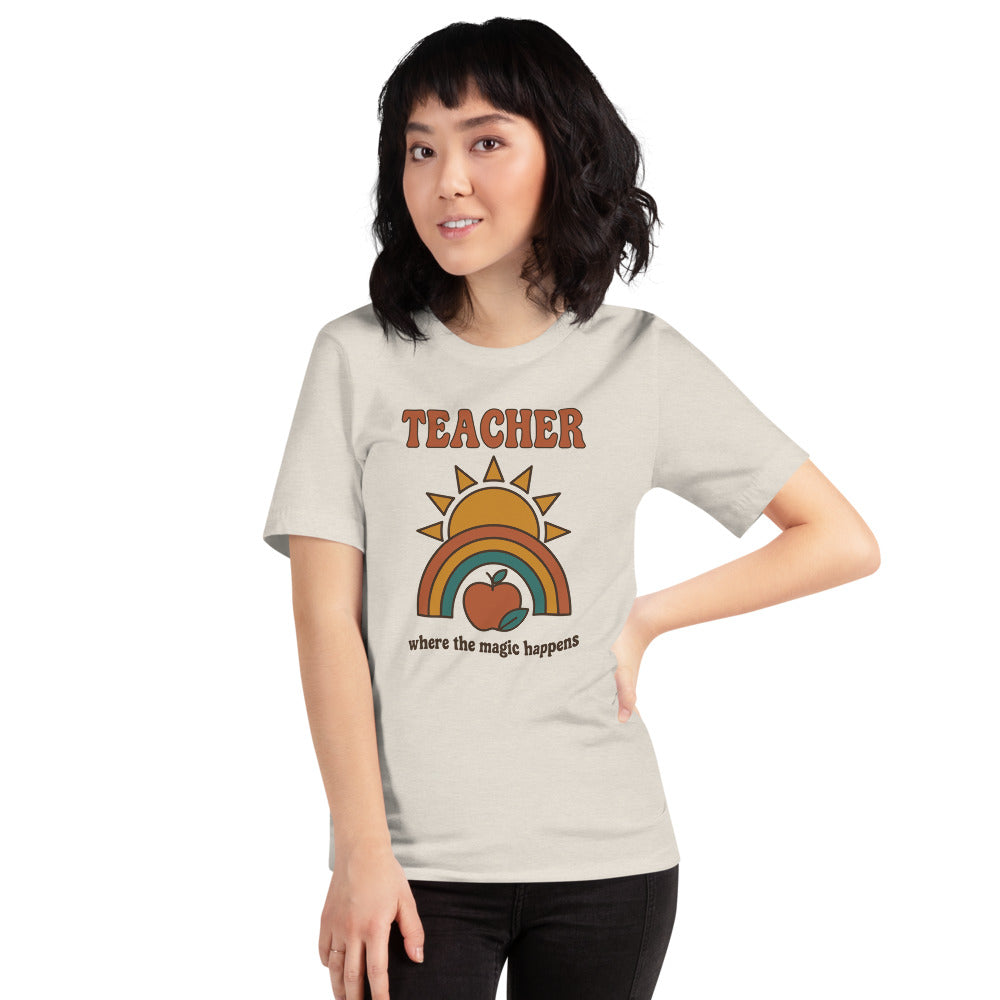 Teacher Where The Magic Happens retro groovy teacher tee — Heather Dust, on model