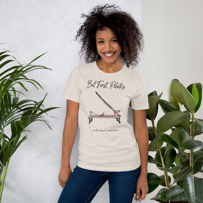 But First Pilates reformer line-art tee — Heather Dust, on model