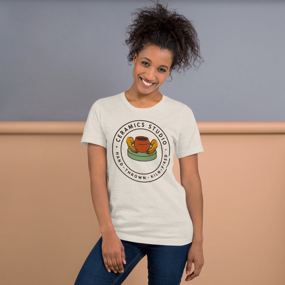 Ceramics Studio Badge hand-thrown pottery t-shirt — Heather Dust, on model