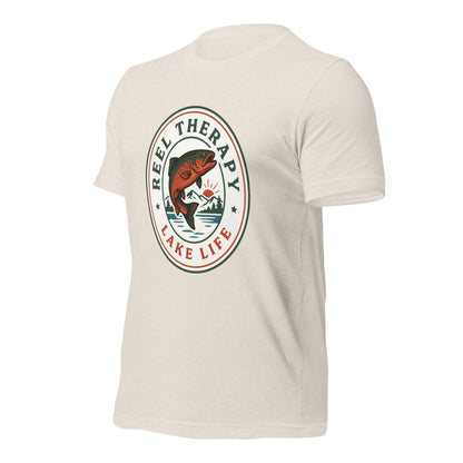 Reel Therapy retro national-park trout badge fishing tee — Heather Dust, front-right