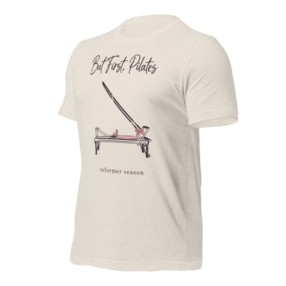 But First Pilates reformer line-art tee — Heather Dust, front-right