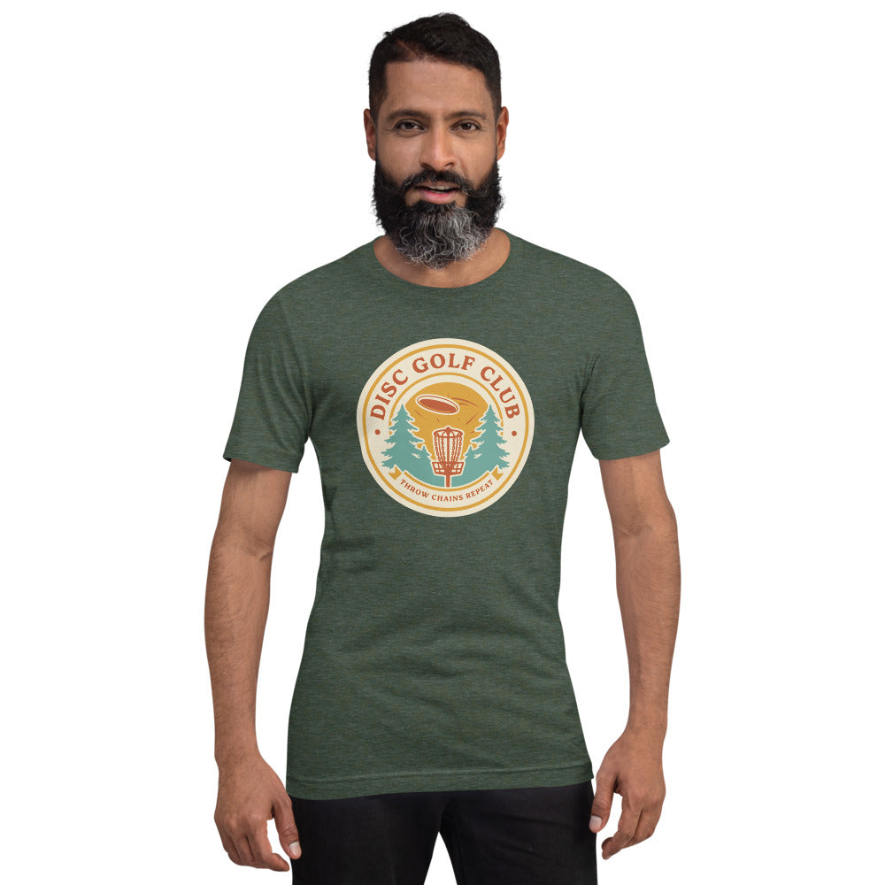 Disc Golf Club retro badge tee — Heather Forest, on model