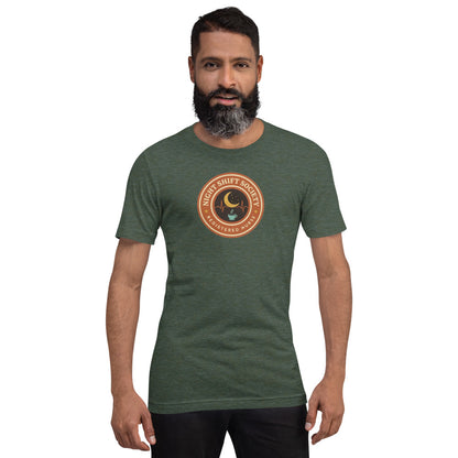 Night Shift Society retro registered nurse badge tee — Heather Forest, on model